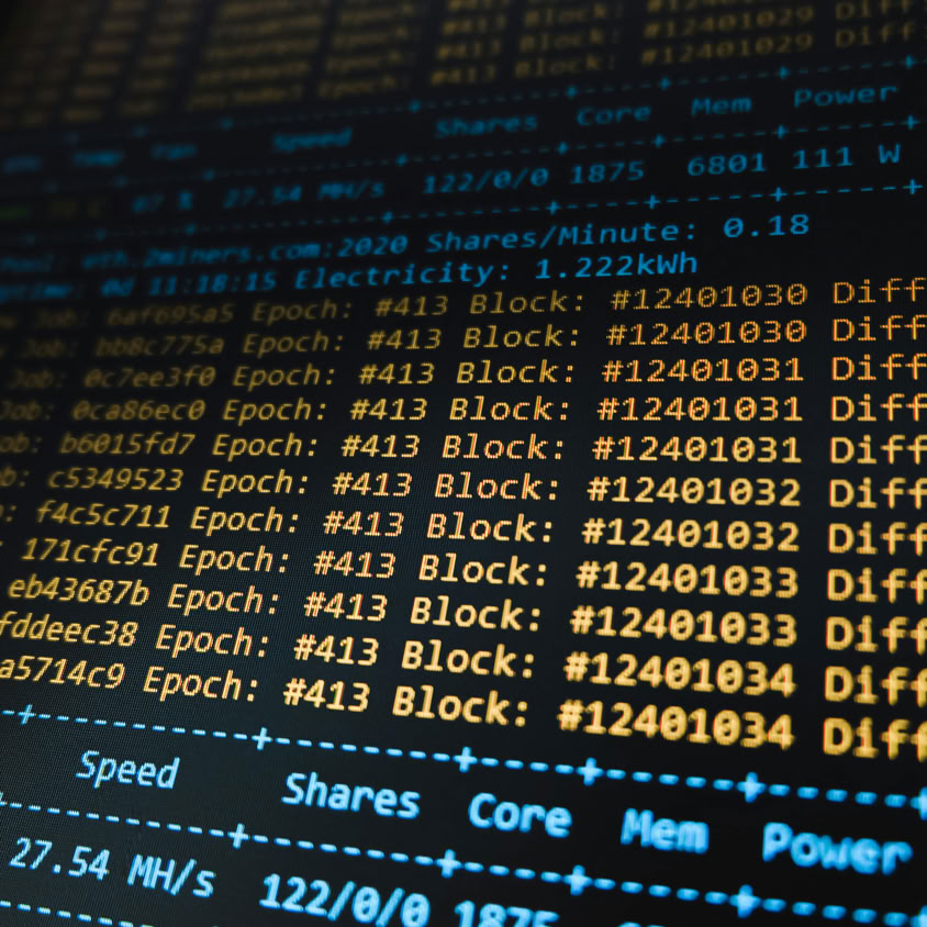 Detailed view of a cryptocurrency mining software interface displaying real-time data on a computer monitor.